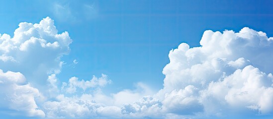 Fototapete - Close-up of a textured blue sky with soft clouds, ideal as a background image with copy space.