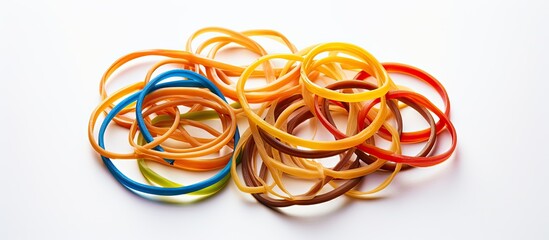 Poster - Rubber bands set against a white background, perfect for a copy space image.