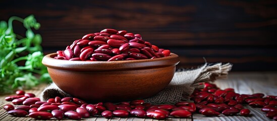 Poster - Red beans are arranged on a wooden table, creating a food-themed image with available copy space for text or design elements, embodying a natural concept.