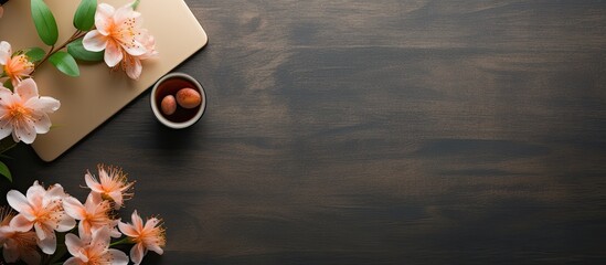 Aufkleber - A phone and a flower are placed on an office desk with various supplies, providing a top view perspective of the arrangement along with copy space image.