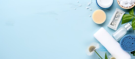 Aufkleber - Top view flat lay composition of a woman's morning routine for face cleaning care with white and blue items on a light blue desk, including copy space image.
