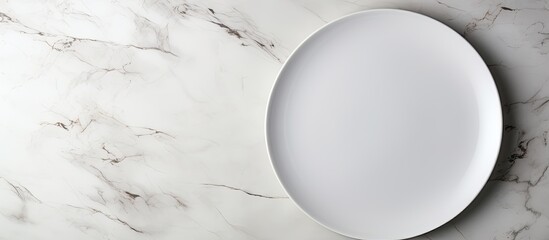 Poster - A blank white plate on a white stone tabletop seen from above, with ample space for additional imagery.