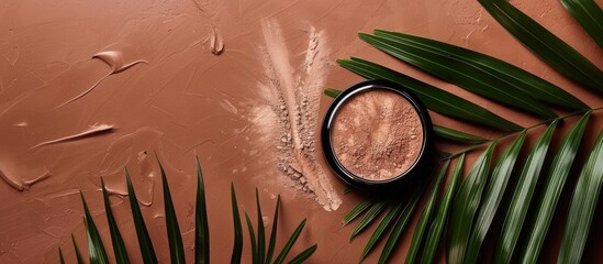 Leinwandbilder - Top view of a modern cosmetic scene featuring bronzer powder and palm shadow overlay, with copy space image.