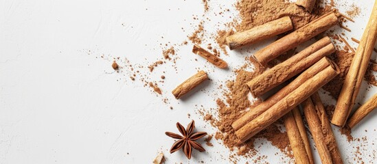 Poster - Ceylon cinnamon sticks and powder on a white background, perfect for adding fragrance and taste to various dishes and beverages, with space for a text overlay, copy space image.