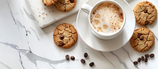 Aufkleber - A visually pleasing scene with a cup of coffee and appetizing cookies arranged elegantly on a white surface with ample copy space image.