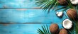 © StockKing - A blue wooden desk features fresh coconuts and a summer-themed flat copy space image.