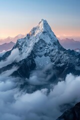 Wall Mural - A majestic mountain peak surrounded by clouds