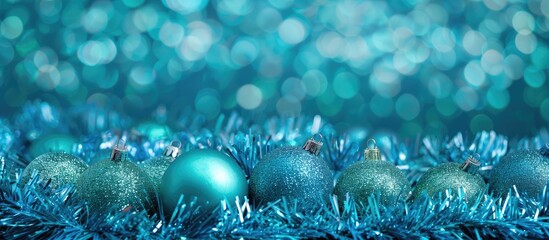 Poster - Turquoise ornaments like tinsel, balls, and garlands for New Year or Christmas, with a copy space image.
