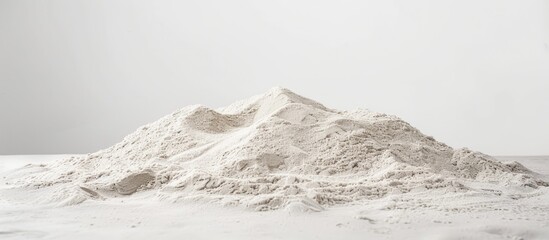 Wall Mural - Sand heap on a white surface