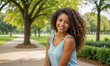 © ROKA Creative - Smiling young woman with long brown hair in a park