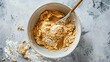 © AkuAku - Raw dough in a bowl for classic cinnamon spiced gingerbread