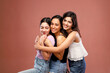 © Royaltyfreecliick - Three Beautiful Indian Models Are Smiling And Hugging Each Other