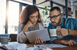 © ClearConcept/peopleimages.com - Tablet, coffee or couple with financial budget, investment growth or planning savings online on website. Inflation, interest rates or people reading recession news for bills or household expenses