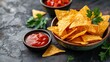 © addymawy - Bowl of tortilla chips with salsa and guacamole. Mexican food, snack food, party food, dipping sauce, appetizer.