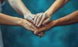 © Ta - Diverse team collaborates, uniting for success through teamwork and HR support.