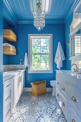 blue and white bathroom with mosaic floor, bright blue walls