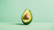 © Nataliia_Trushchenko - A green avocado is cut in half and placed on a green background. The avocado is the main focus of the image, and it is fresh and ripe. The green background adds a sense of freshness