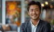© Sang - Portrait of Asian businessman smiling with arms crossed in studio, for corporate or CEO fashion, with happy face and copy space on bright white background.
