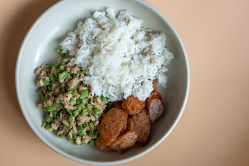 Wall Mural - Steam rice serve with stir-fried long bean, mince pork and Chinese Sausage. Asian homemade menu.