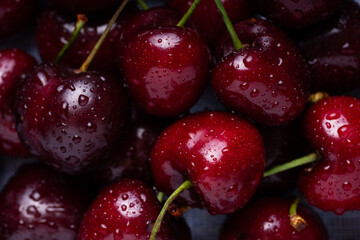 Poster - Fresh red cherries fruit. Fresh organic berries with leaves macro. Large collection of fresh red cherries. Ripe cherries background. Lot of red ripe cherries close up with water drops.