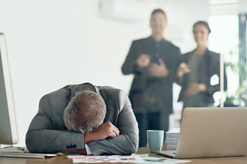 Wall Mural - Mature business man, sleeping and office with people for laughing, bullying and joke for age at accounting agency. Stress, fatigue and burnout with rest and fear of mocking coworkers at workplace