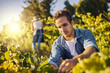 © Stratford/peopleimages.com - Farmer, man and plants for growth, harvest and working in agriculture in sustainable business in Spain or Europe. Supplier or people farming or gardening with green vegetables for food supply chain