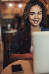 Canvas Print - Woman, typing and laptop at night in cafe, copywriter and online research for article deadline. Female person, website and feature for project proposal, planning and diner for remote work in diner