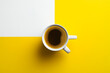 © SANA - cup of coffee, An ultra-realistic top view image of a coffee cup placed on a vibrant yellow and white background
