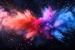 © abstract Art - Explosion of colored powder isolated on black background