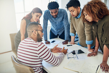 Poster - Business people, group and feedback in meeting, digital agency and planning for project. Behind, employees or graphic designer with documents for review, projections for development and collaboration