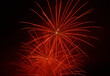 © ajcsm - Red fireworks exploding in the open sky, festivity and fun