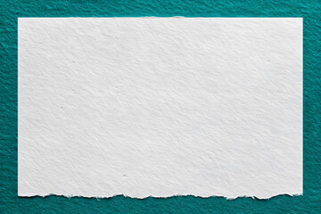 Wall Mural - texture of craft white color paper background with emerald border, macro. vintage dense kraft teal c