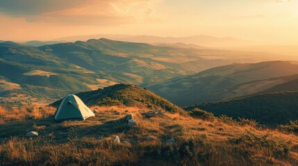 Wall Mural - A scenic campsite on a hilltop overlooking a sprawling valley bathed in the golden light of the setting sun.