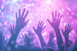 © enterdigital - Vibrant concert crowd with hands raised in celebration under colorful lights, creating a lively and energetic atmosphere.