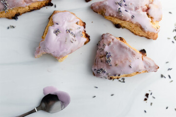 Wall Mural - Lavender glazed scones, a sweet crumbly delight