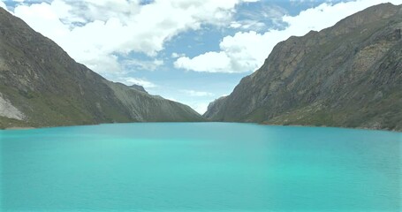 Wall Mural - Turquoise waters of Paron lake surrounded by rugged Andean mountains