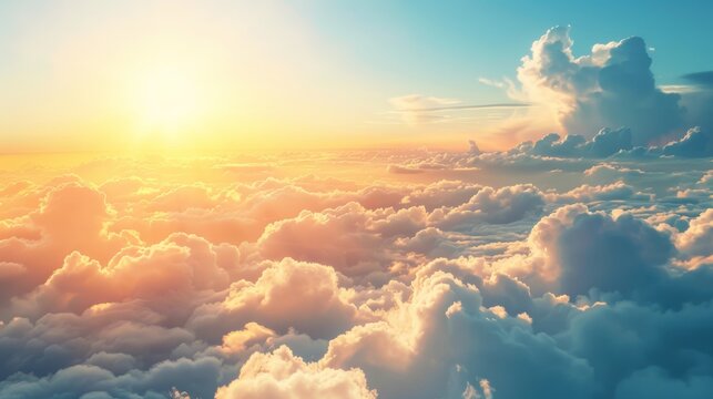 sunrise on blue sky. Blue sky with some clouds. View over the clouds.