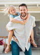 © peopleimages.com - Portrait, man and piggyback child outdoor for love, bonding embrace and playful interaction of support at house. Smile, father and girl with hug for family activity in backyard for memory at home
