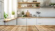 © Alona - Desktop Empty. Clean and Modern Kitchen Interior with Wood Table Top Counter and Blur Background