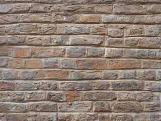 Wall Mural - dark red brick wall background