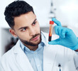 © peopleimages.com - Man, scientist and lab with blood sample in test tube for medical analysis, investigation and research. Science, healthcare development and vial for dna exam or study and scientific experiment