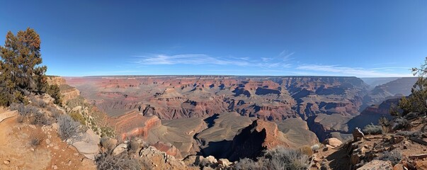 Canvas Print - A breathtaking panorama of the Grand Canyon, its layers of rock revealing millions of years of geological history.