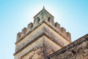 Fototapete - Ancient fortress. Detail of a medieval castle tower.