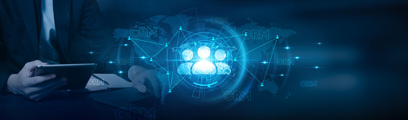 Poster - Customer Relationship Management. Businessman using laptop and CRM software with data growth on sales, marketing, customer service, analytics, and global network.