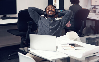 Poster - Headphones, relax and black man with laptop in office listening to podcast with finished architecture project. Smile, satisfaction and African architect with computer for achievement in workplace.