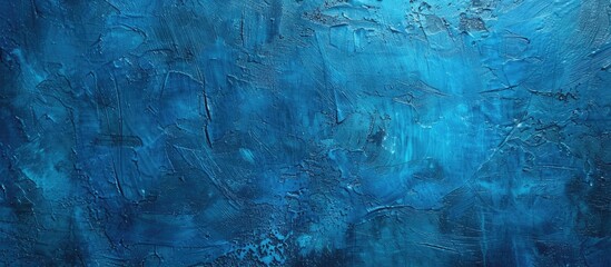 Rough blue textured grunge background in close up view