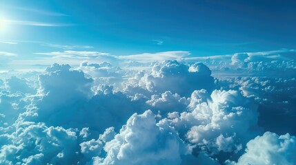 Wall Mural - Blue sky with white cumulus clouds background ample space over the clouds