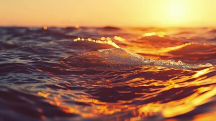 Wall Mural - Abstract photo of surface water of sea or ocean at sunset time with golden light tone.