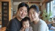 © Creations Photo  - Portrait of a Korean family with parents and their young toddler kid at happy home.