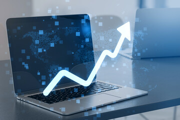 Poster - Laptop displaying a rising graph with a world map hologram, depicting a business growth concept with a creative double exposure effect on a blurred background